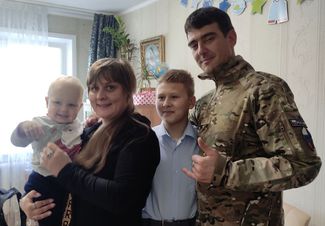 Ilya Bakharev with Svetlana Bulavina and their children