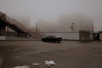 Парковка рядом с «Ашаном», который попал под обстрел 30 августа 2023. Февраль 2024 года