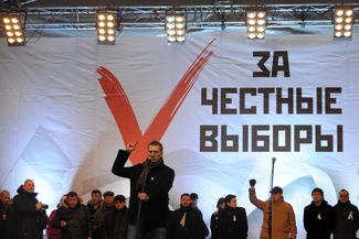 Because he was arrested, Navalny missed the first big rally of the “winter of protests,” but he spoke at the next rally to around 100,000 people. From the stage, he said, “There are enough people here to take both the Kremlin and the White House [the main offices of Russia’s national government] right now, but we are peaceful people and we won’t…yet.” His speech that day became one of the most famous in modern Russia. 